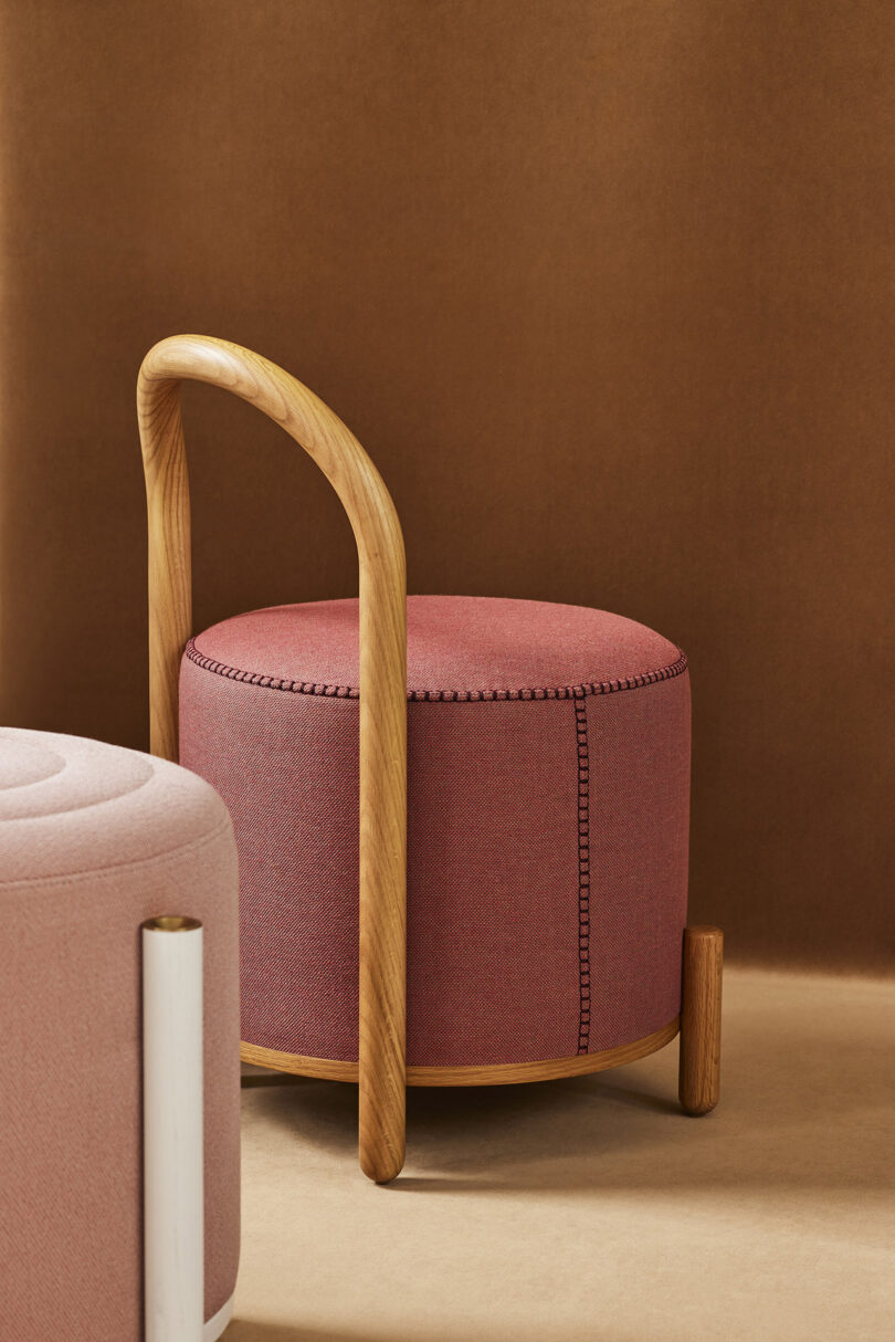 back and side of dark pink pouf stool