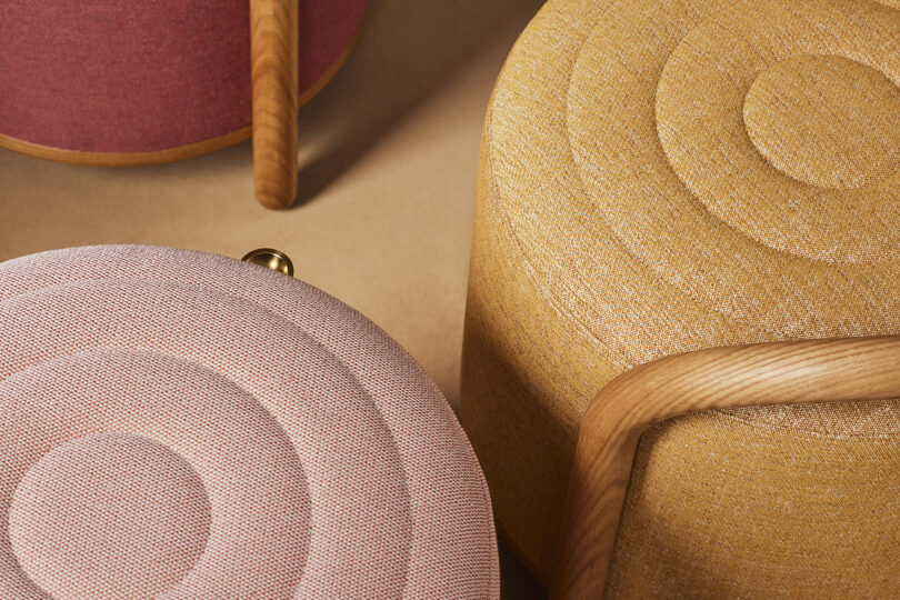 detail of pouf stools in warm tones