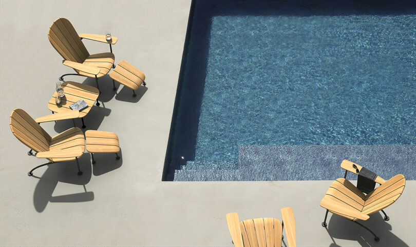 four modern wood adirondack chairs next to a pool