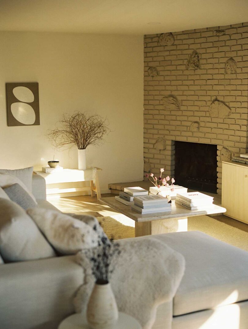 angled interior shot of modern living room in light colors