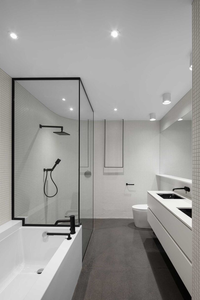 interior view of modern bathroom with white marbled surfaces