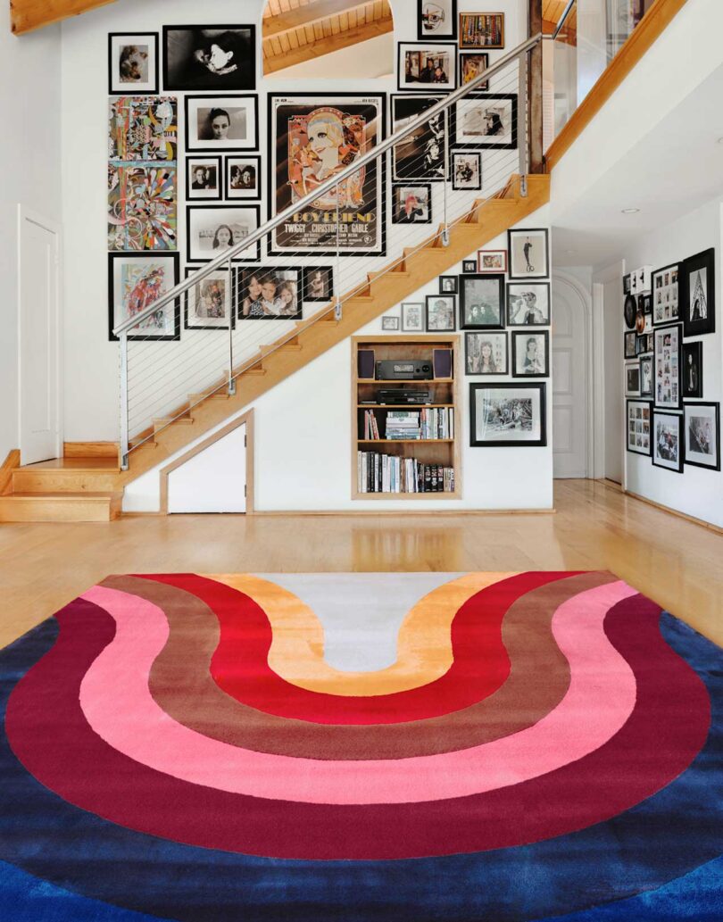 modern living space with bold colorful rug in foreground