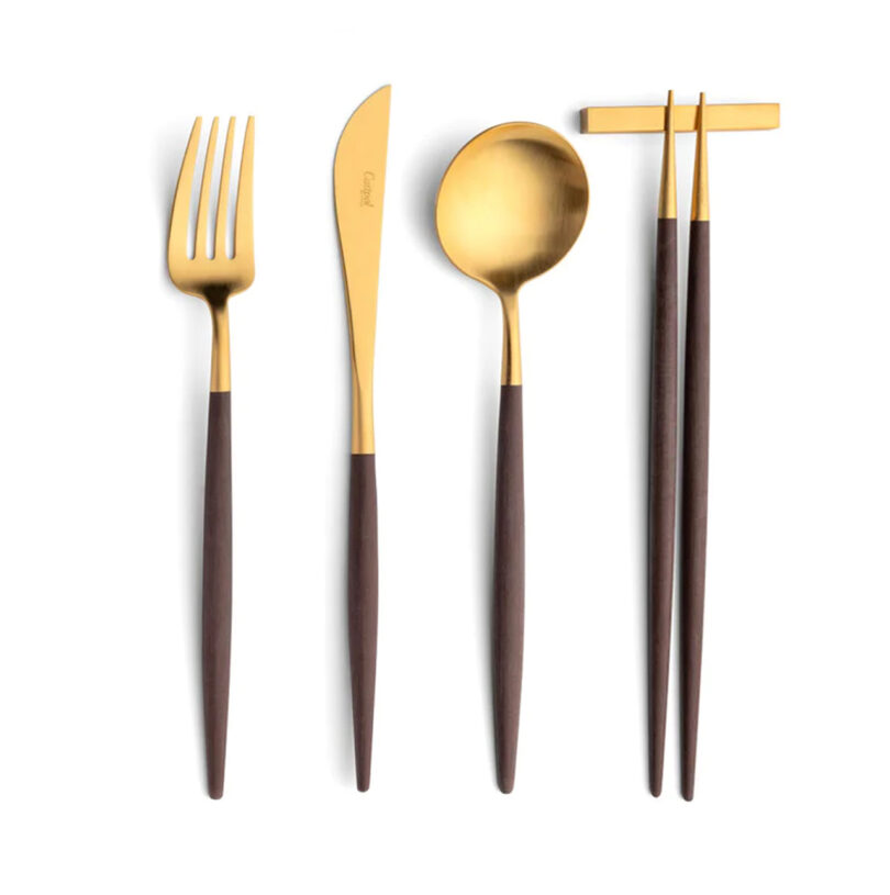 modern black and gold silverware and chopsticks