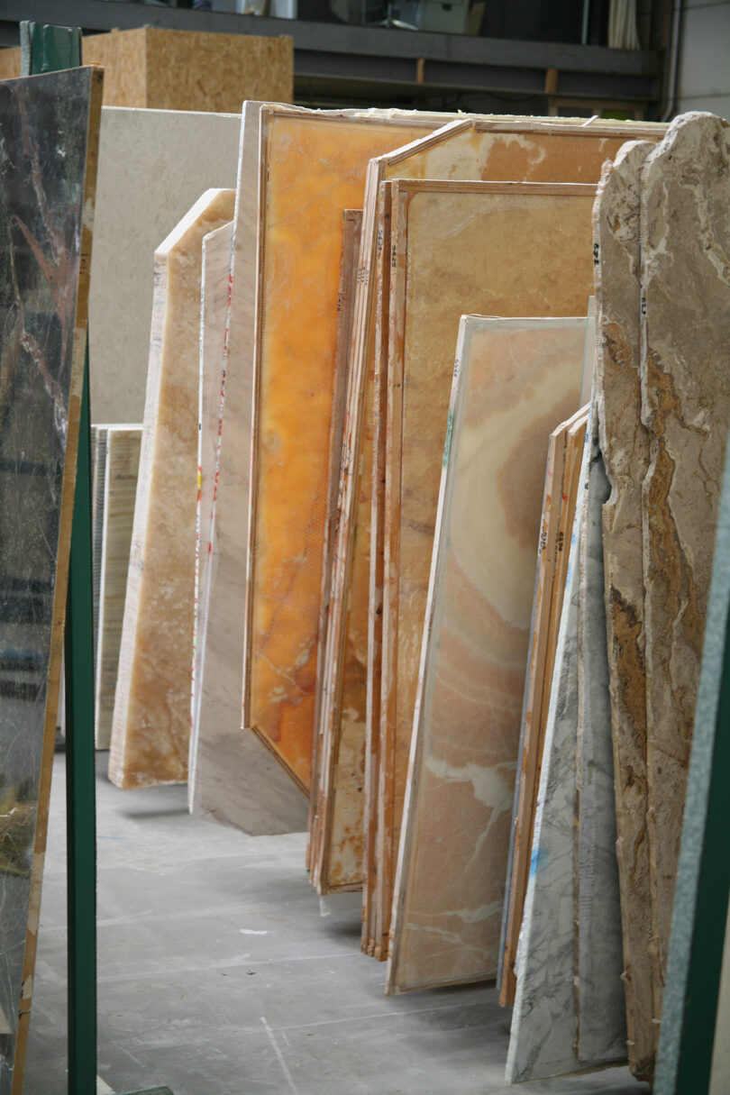 various marble slabs lined up next to one another