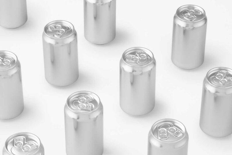 angled down view of multiple chrome beer cans