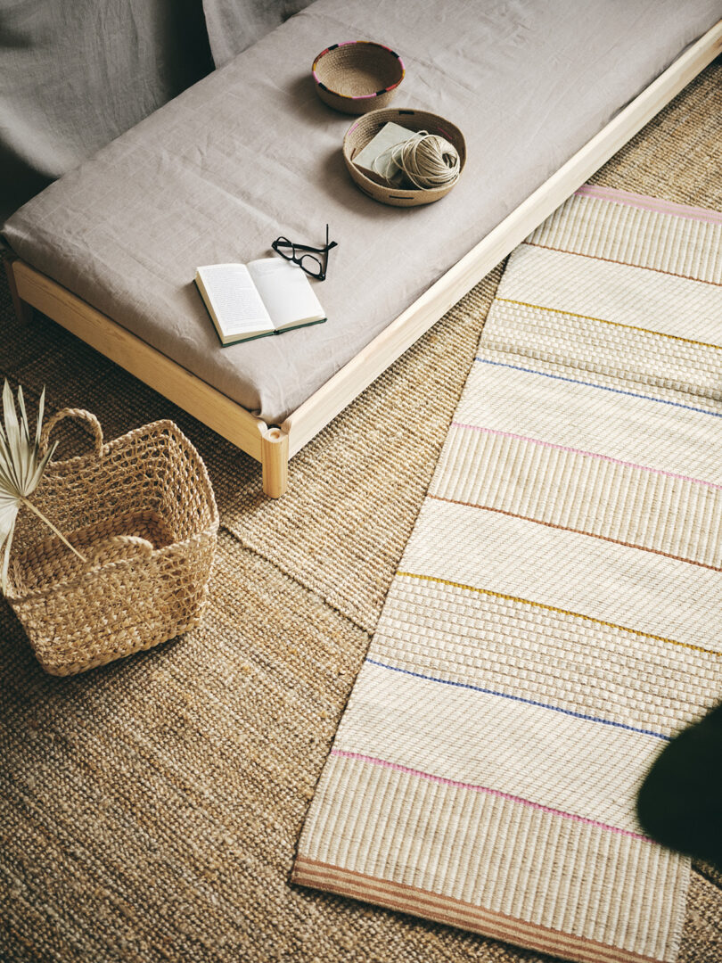 bench, basket, and neutral striped rug