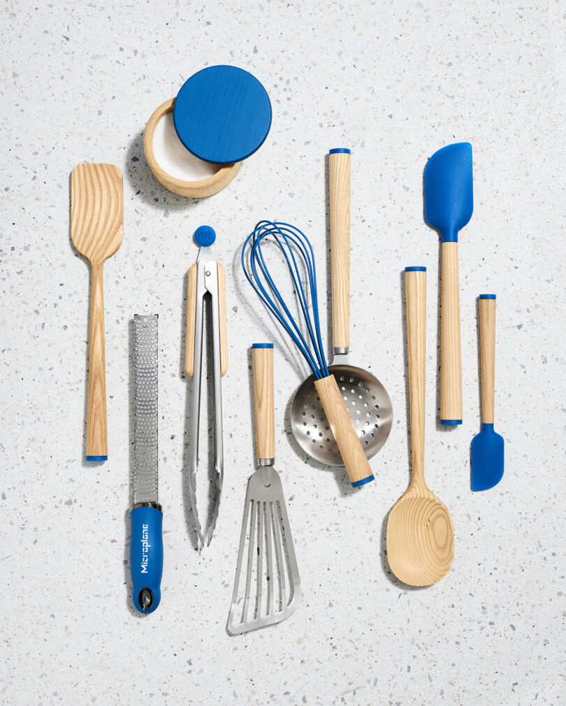 blue kitchen utensils on a white background