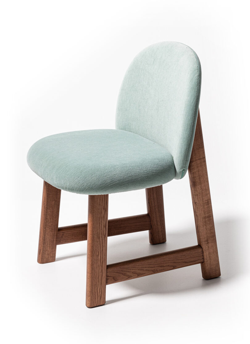 light blue and wood chair on white background