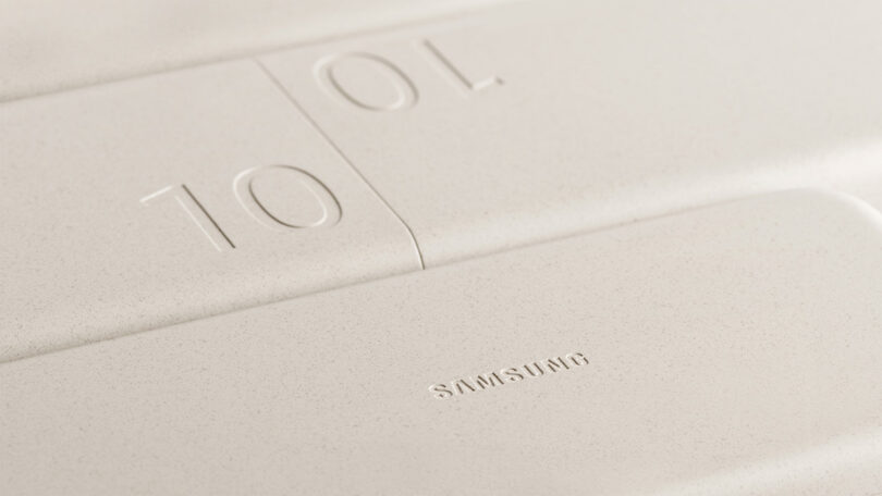 Close up of neutral hued Samsung x Layer Battery Packs showing debossed "10" graphic.