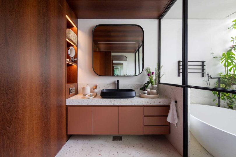 modern bathroom with vanity and mirror