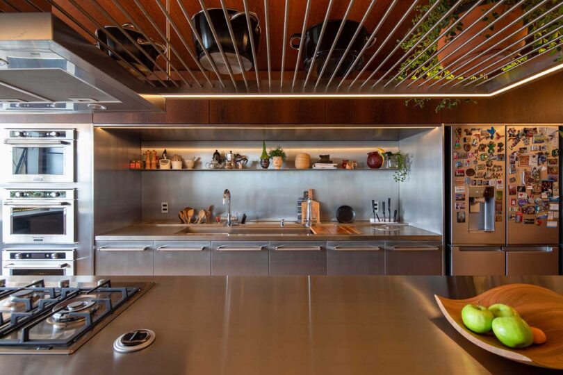 partial view of modern kitchen with stainless steel appliances