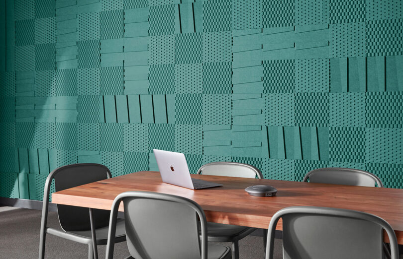 turquoise textured acoustic wall tiles in a styled space