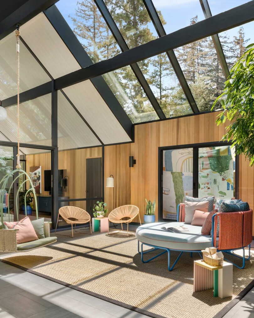 angled interior view of mid-century modern living space with glass roof