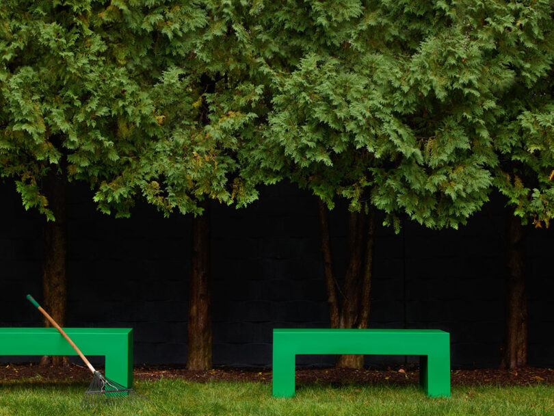 two minimal modern green outdoor benches