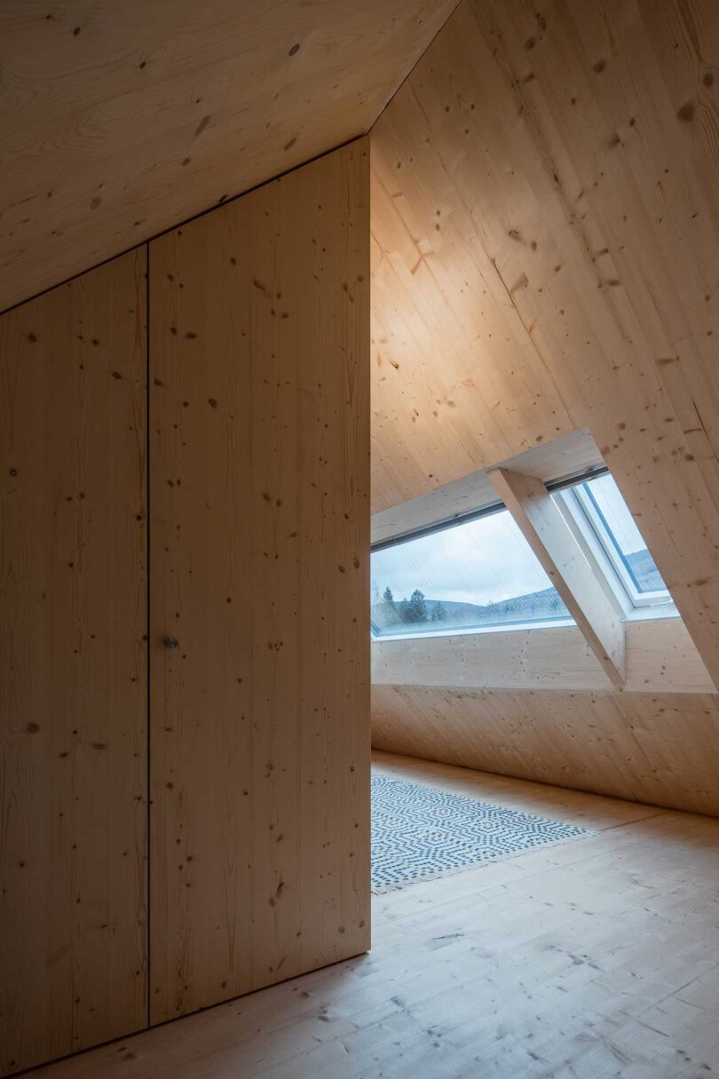 interior angled view of modern space with slanted wood wall
