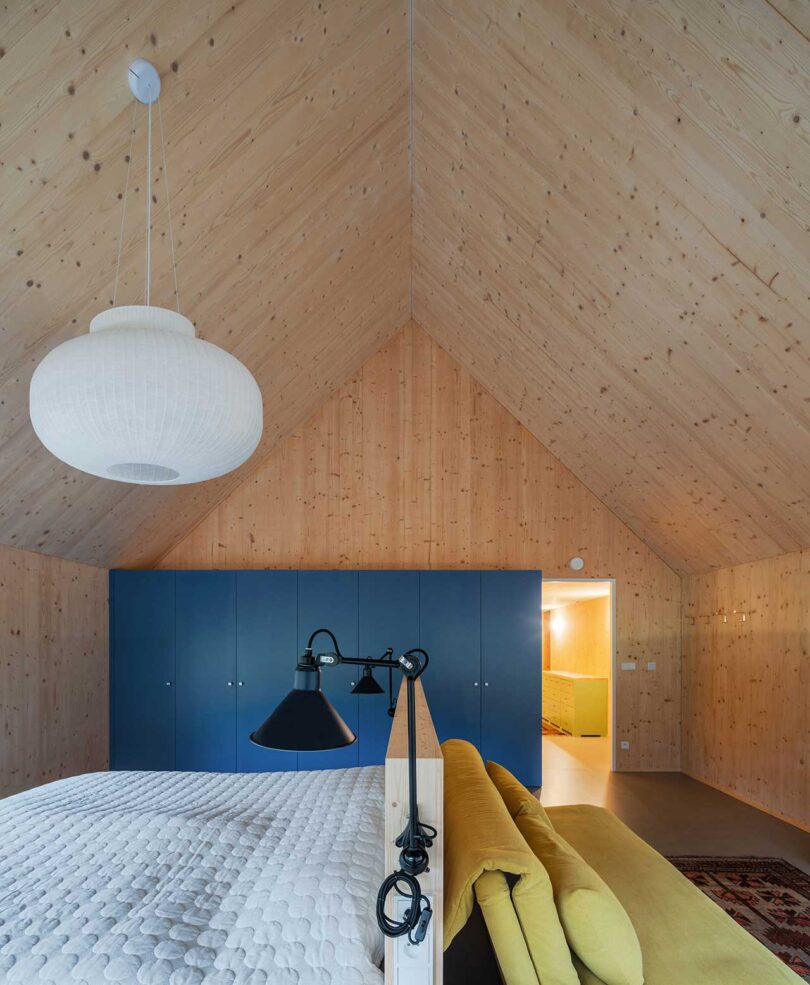 interior shot of room with pitched wood roof ceiling