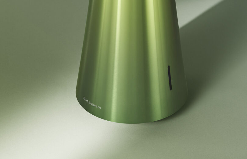 Detail photo of bottom half of Beosound 2 wireless speaker in Gradient Green