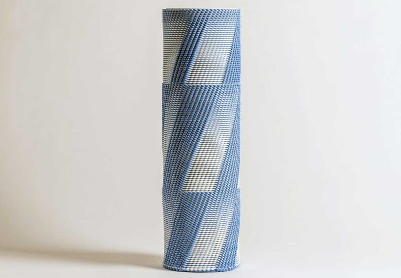 cylindrical 3d printed blue and white vase