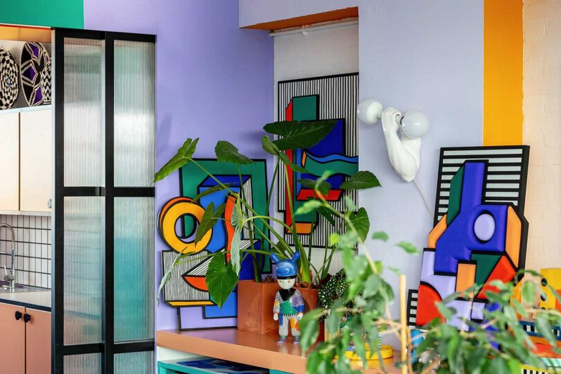 corner view of vibrant studio office with geometric artwork