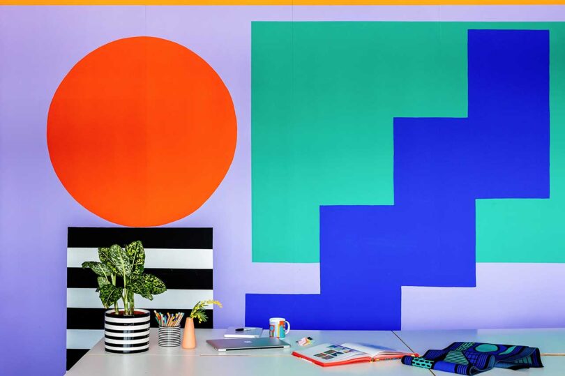 closeup of colorful geometric mural in vibrant studio office