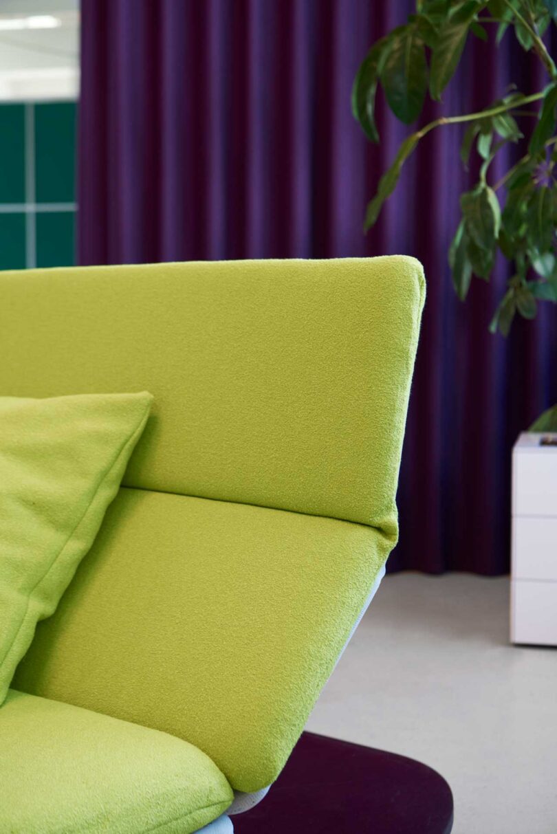 view of modular sofa with green fabric