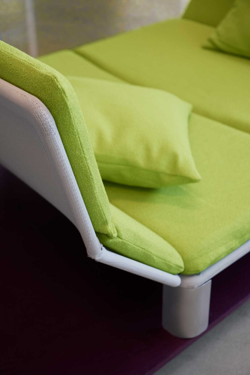 down back view of modular sofa with green fabric