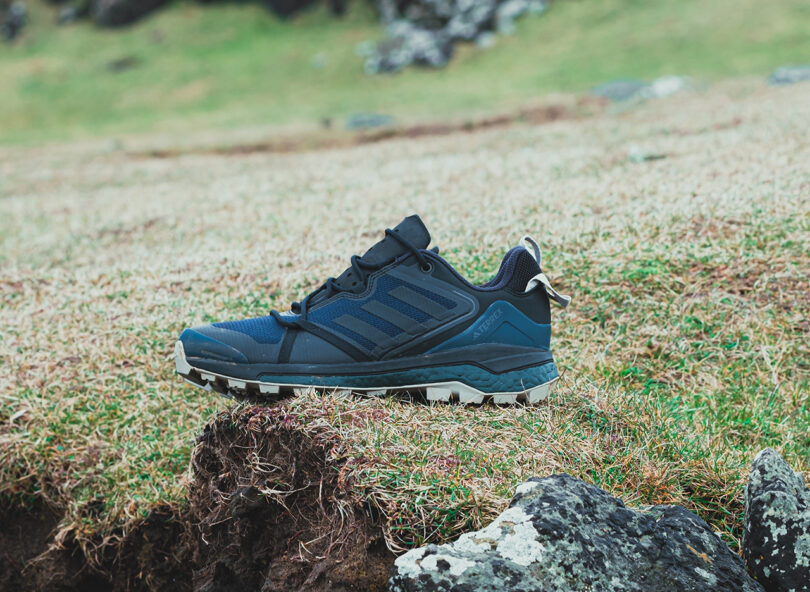 Norse Projects x Adidas Terrex Skychaser hiking midtop shoes set on tundra landscape of the Faroe Islands.