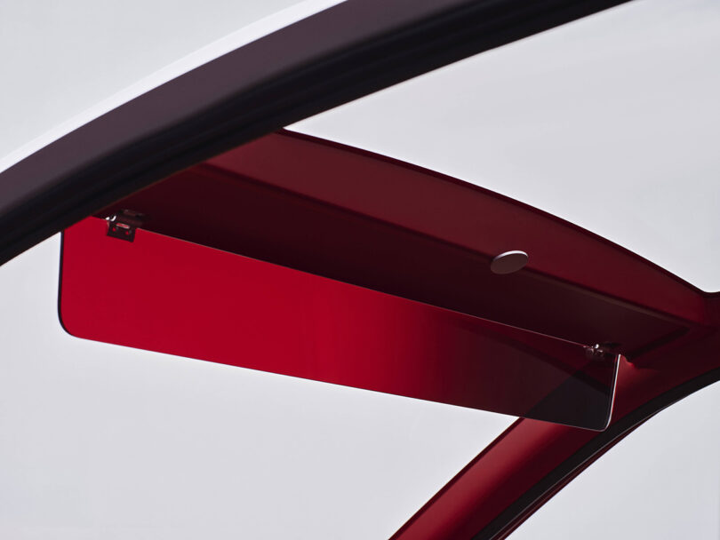 Detail of the transparent all-red shade inside the Renault Twingo.