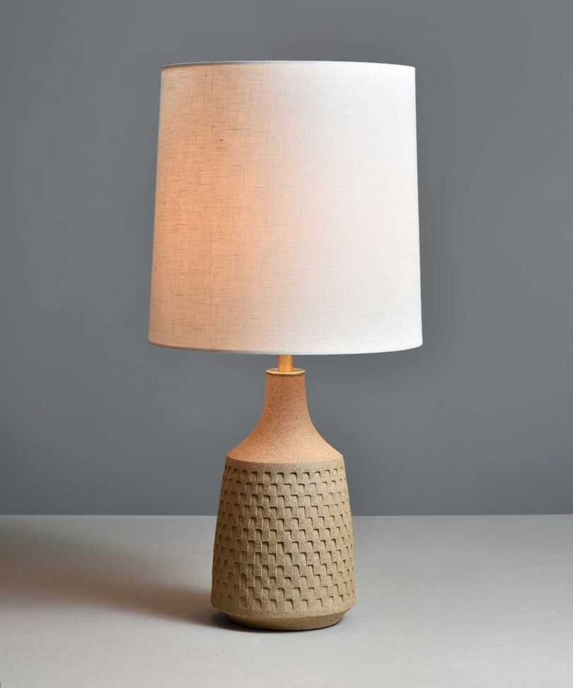 light earthy colored textured ceramic lamp with shade