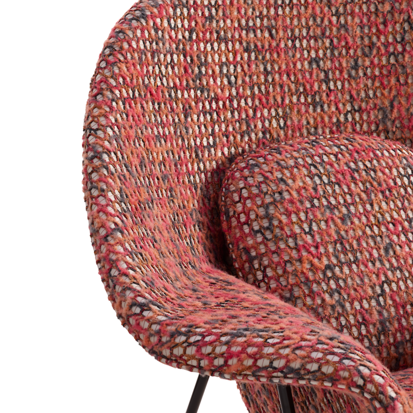 closeup side view of red upholstered chair