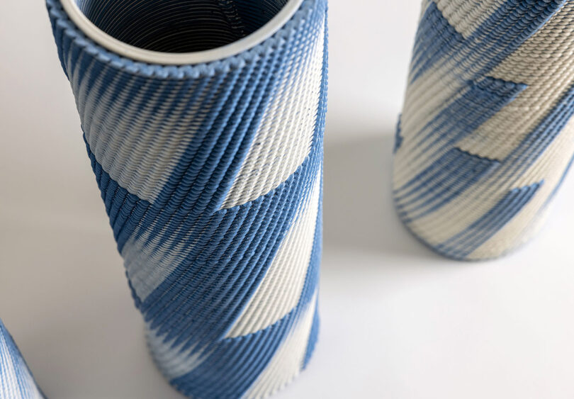 Detail corners of Dyadic Series dual extrusion 3D printed ceramic sculptures, showing details of their woven-like patterns and textures created by 3D printing with two clay colors simultaneously. 