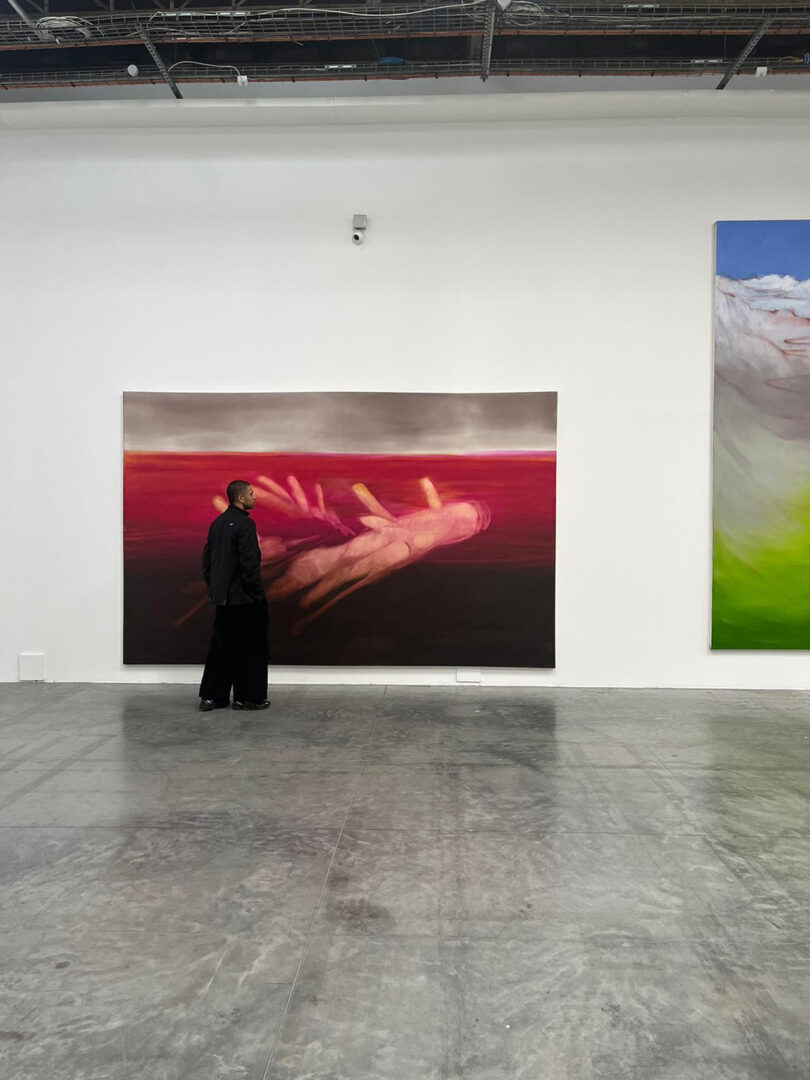 a gallery displaying oversized works of art