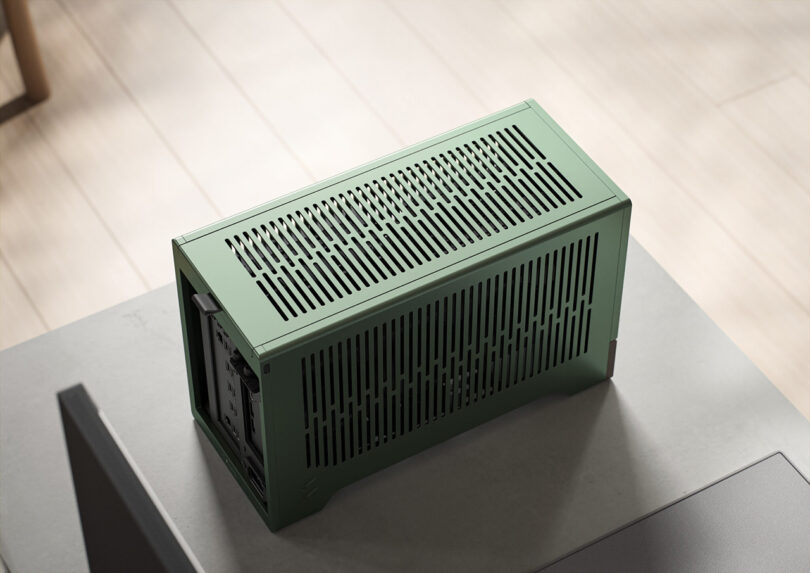Overhead angled view of green Terra case showing its multitude of vent ports along its side and top.