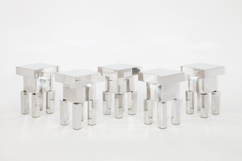 five squared off mirrored stools