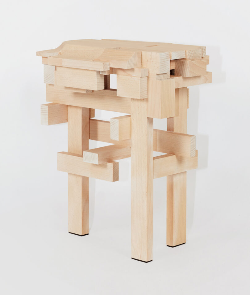 wood stool made of squared off pieces of wood