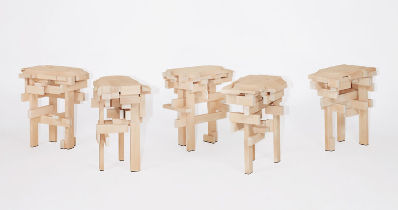 five wood stools made of squared off pieces of wood