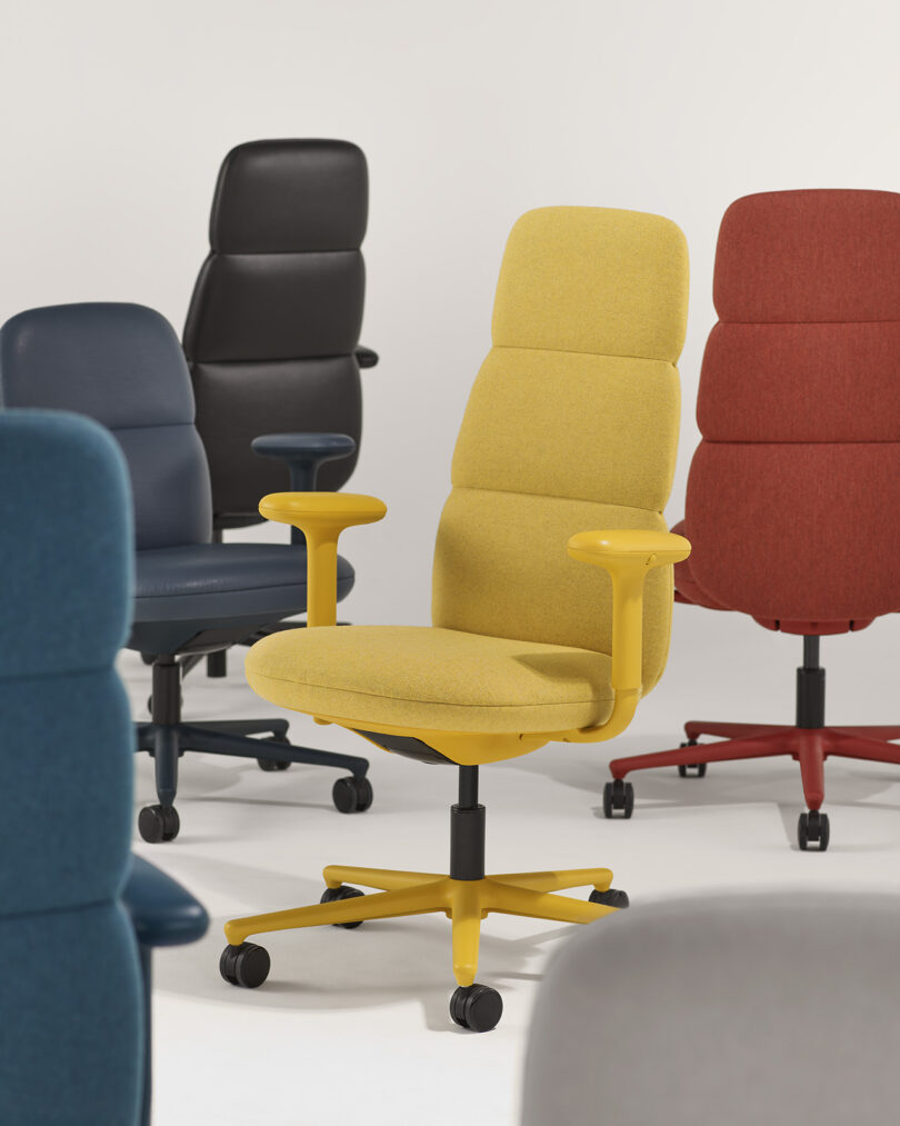 Five different Asari chairs in low and high options, with blue, teal, black, yellow and red upholstery.
