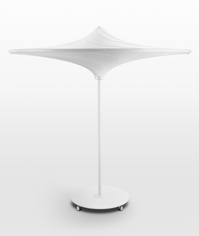 white outdoor umbrella with built-in light on white background