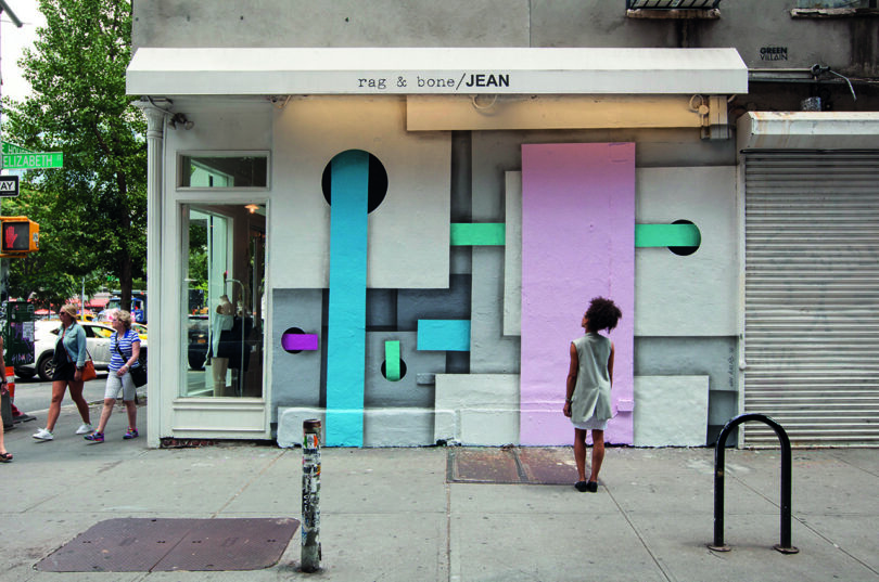 store exterior with pipe-like pastel graffiti