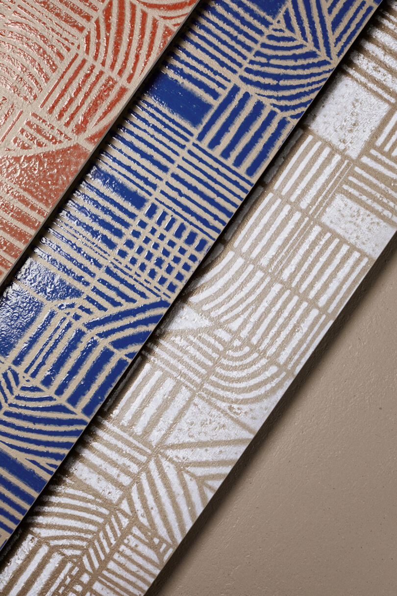 selection of terracotta, blue, and white geometric tiles