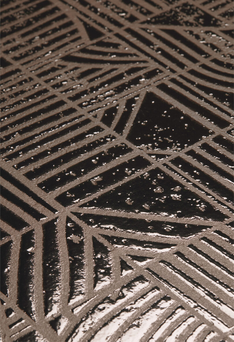 geometric black and beige tiled floor