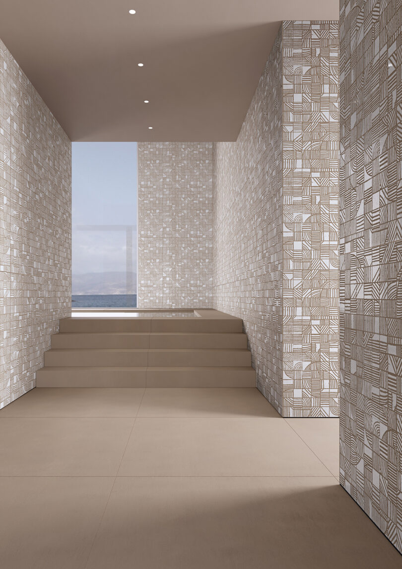 open interior room with stairway styled with beige and white tiled walls and beige tiled floor
