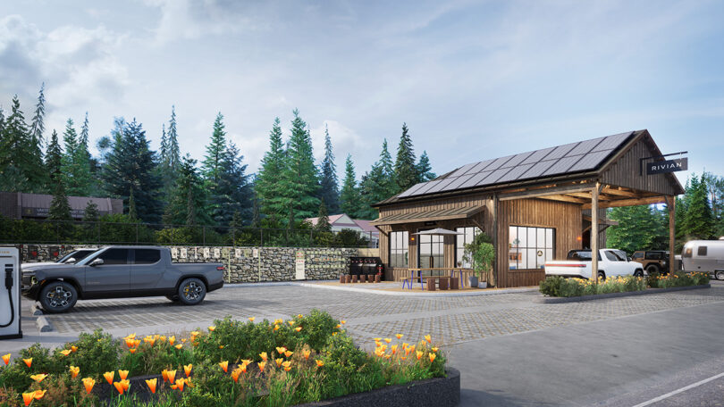 A render of cabin-like Rivian Spaces, a location of a former historic gas station, with Rivian trucks parked out front.