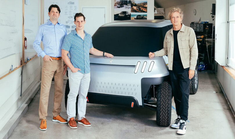 TELO's Jason Marks, Forrest North, and Yves Béhar standing next to truck prototype in studio.