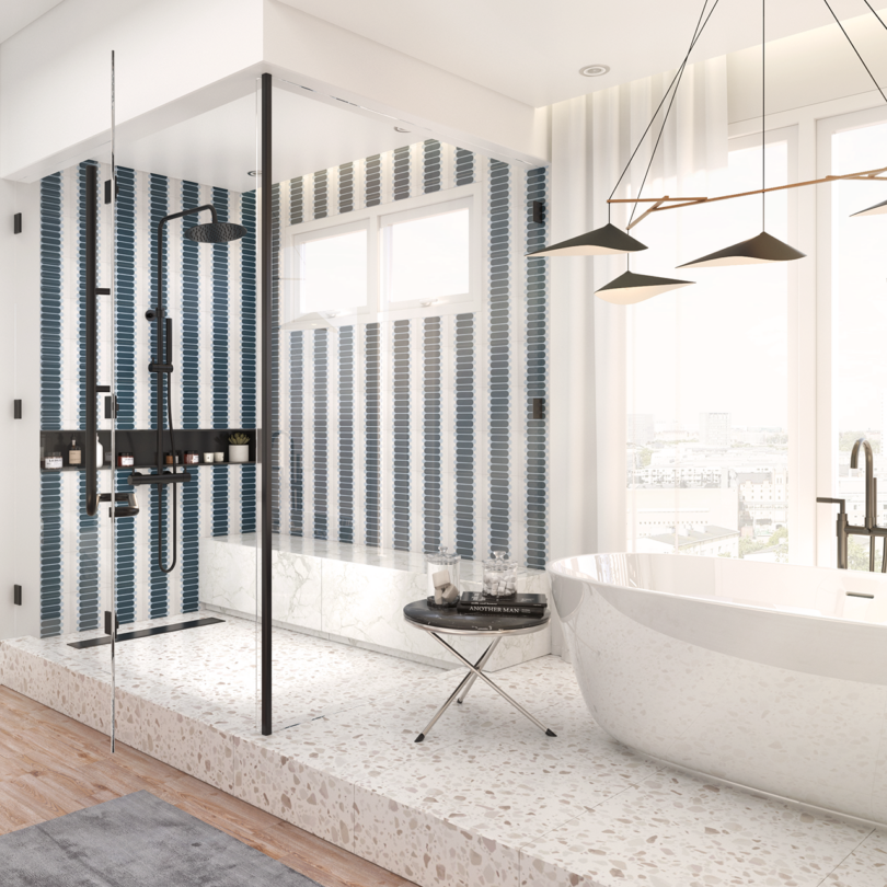 bath with walk-in shower featuring navy and light blue patterned tiling on the walls
