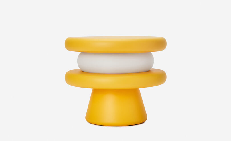 Side view of yellow Macaron table light.