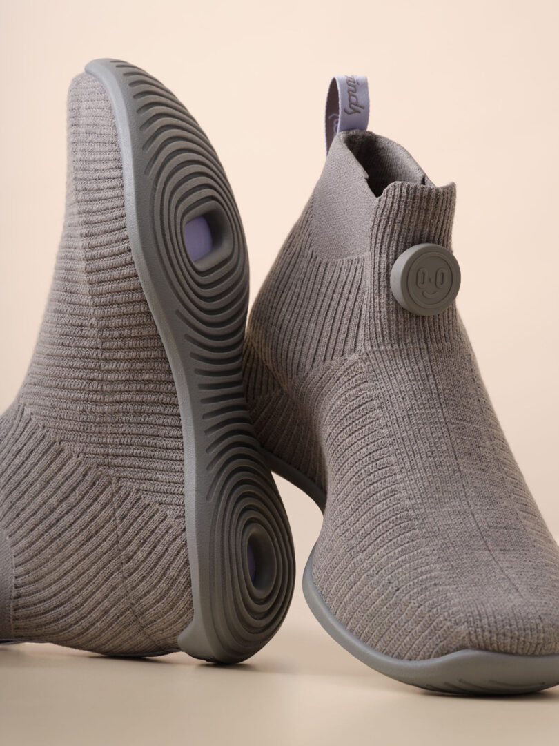 Detail of the top and underside of the laceless tab upper of the Allbird Moonshot wool sneaker