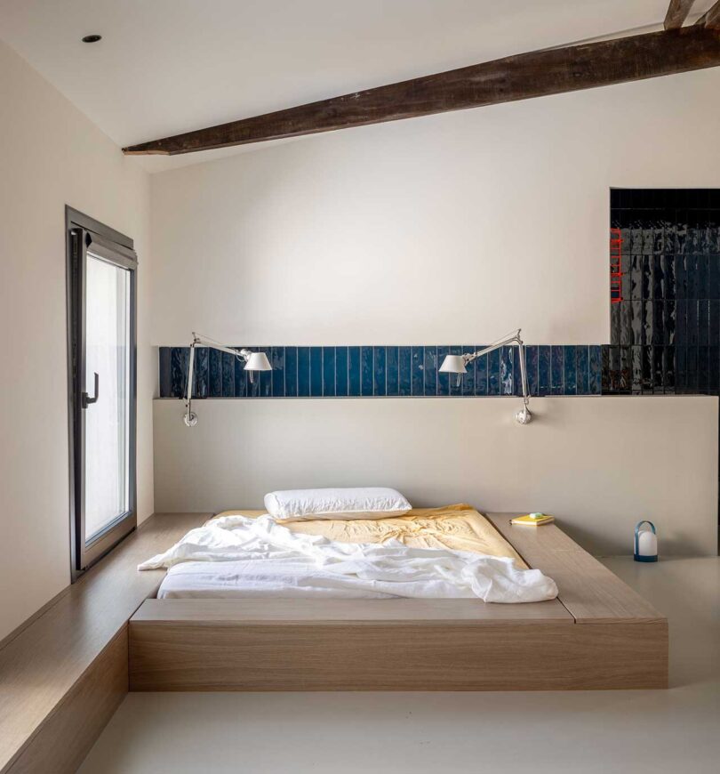 modern bedroom with built-in bed with mattress inset