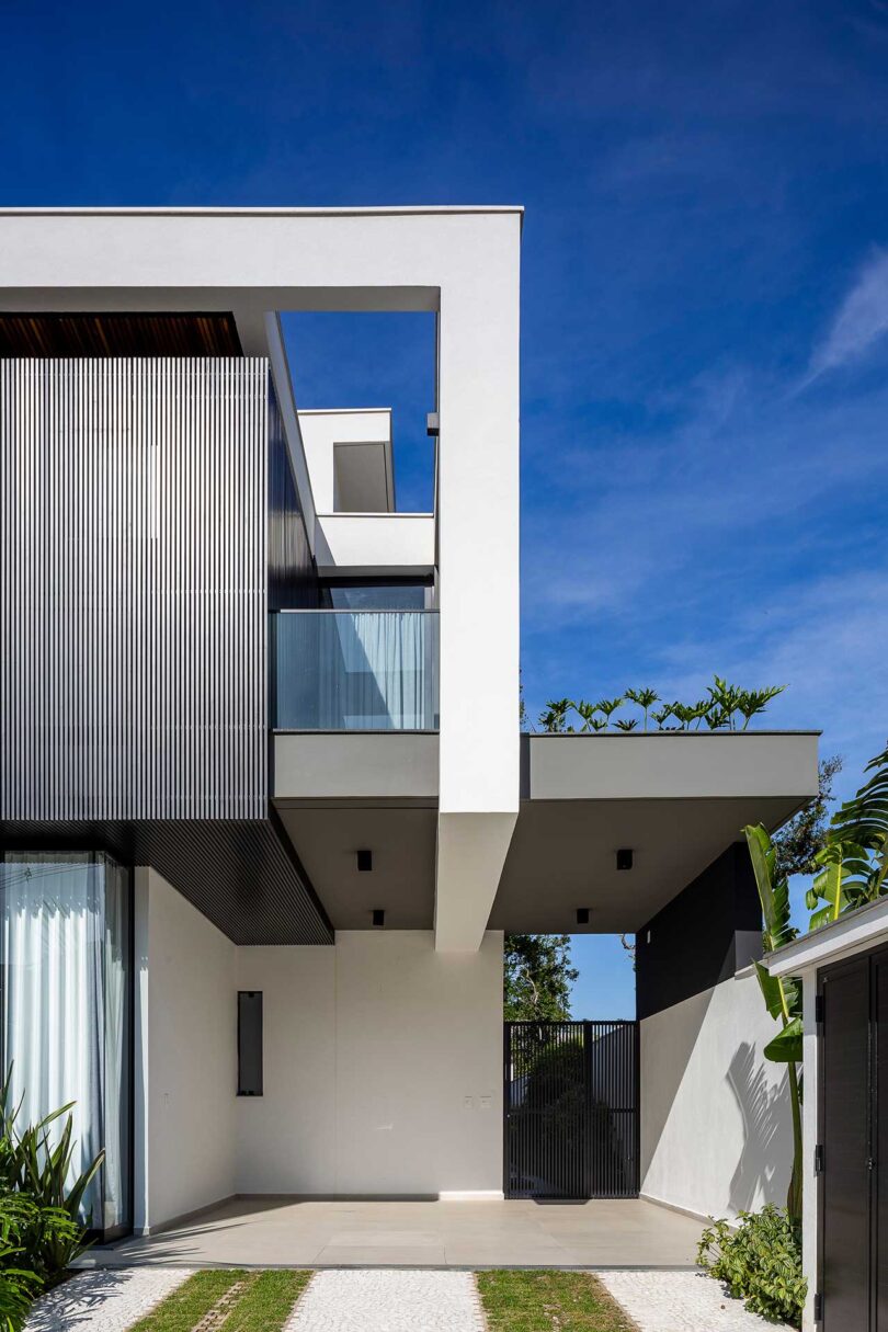 partial exterior view of modern house with black and white details