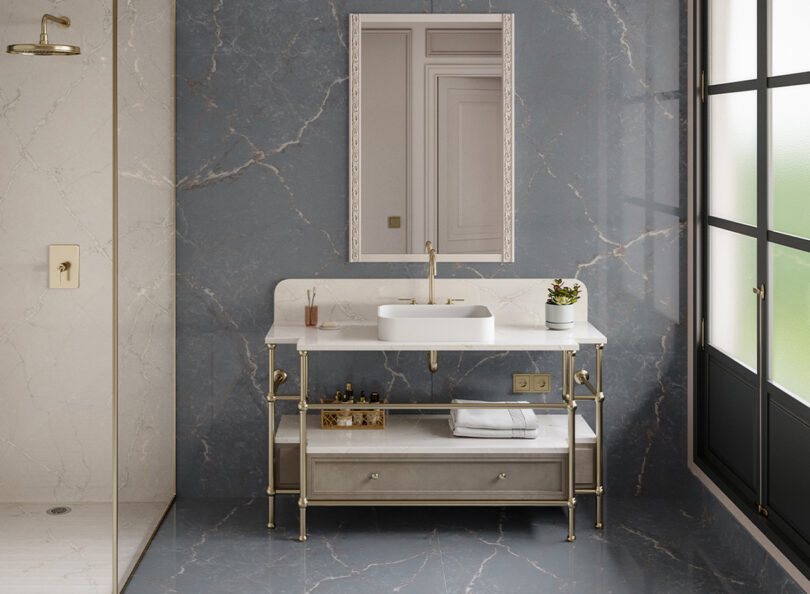 white bath vanity and mirror with grey floor and wall